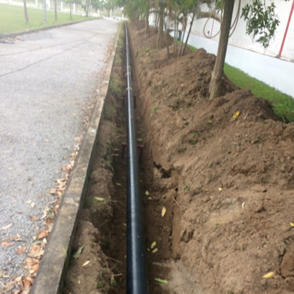 Once wrapped, the pipework is then placed in the ground and connected to the sprinkler system