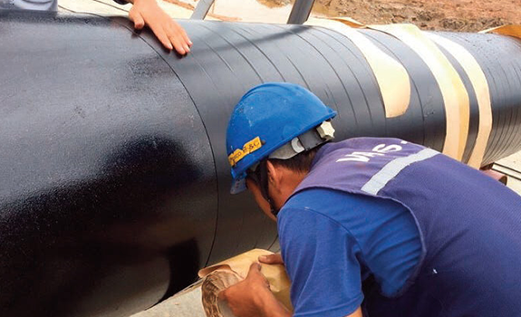 The pipe during application of Premcote 101 Tape at Water Treatment Facility in Vietnam