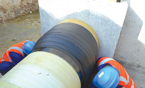 Premcote Primer, Premier Joint Moulding Putty and Premcote 1500 Tape used to protect buried steel coupling in Qatar