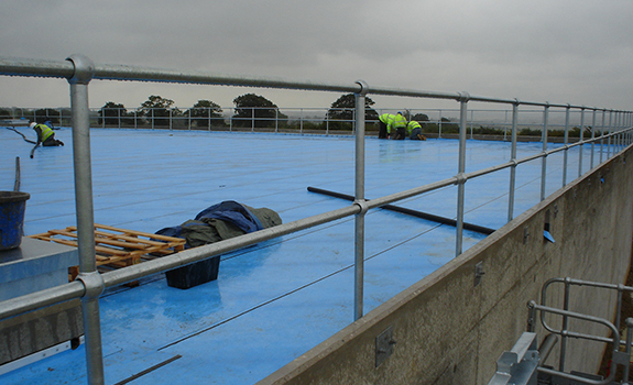 Application of Premseal 100 onto concrete reservoir roof