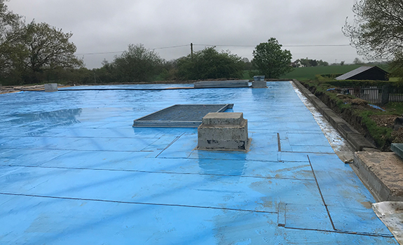 Premseal 100™ Waterproofing Membrane and Premseal™ Primer applied to the concrete roof slab to stop the ingress of any surface water.
