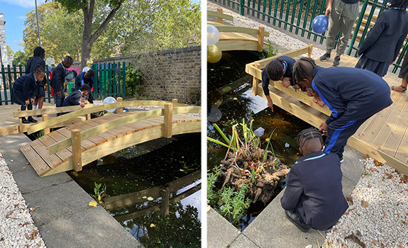 Children admiring the new pond at St Luke's funded by F.B.Coales No.4 (Family) Trust